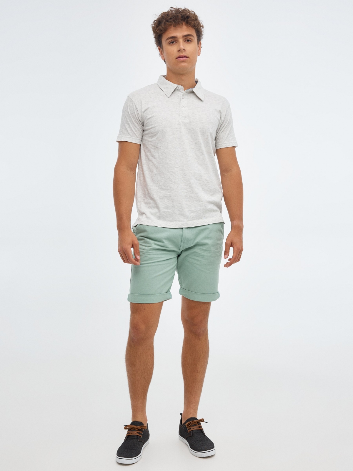 Bermuda shorts with belt green front view