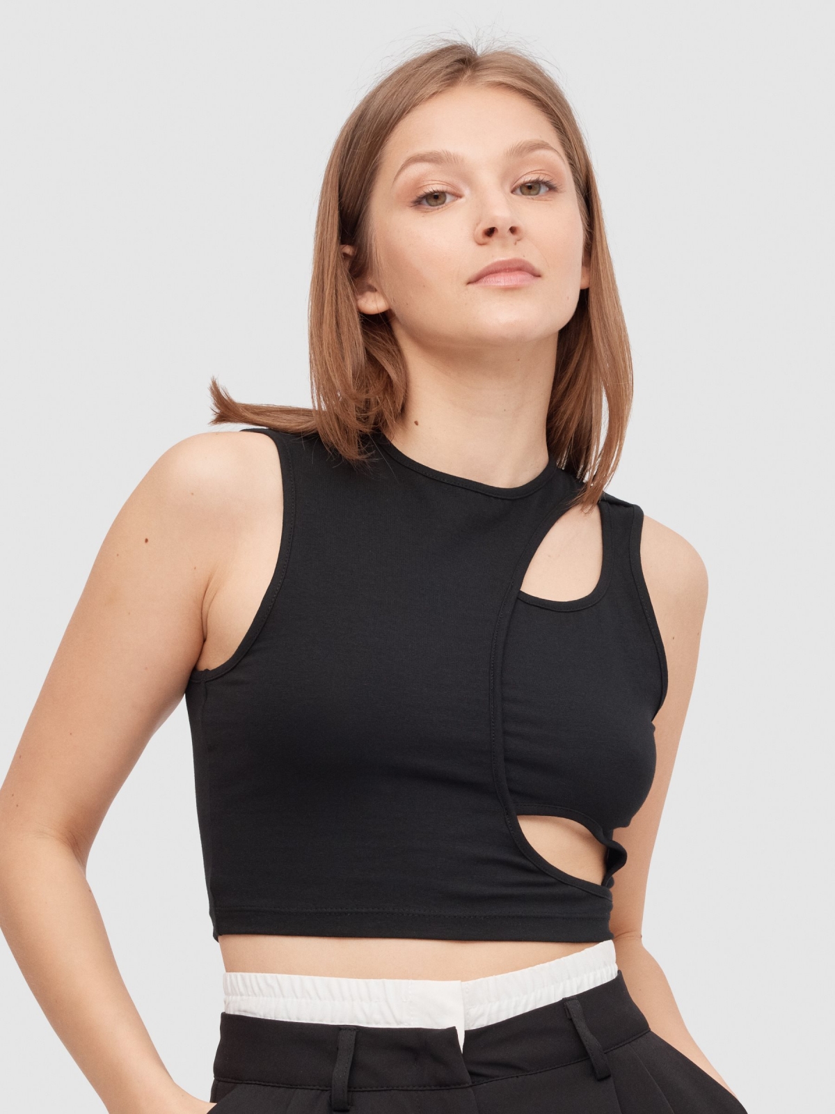 Asymmetric cut-out top black middle front view