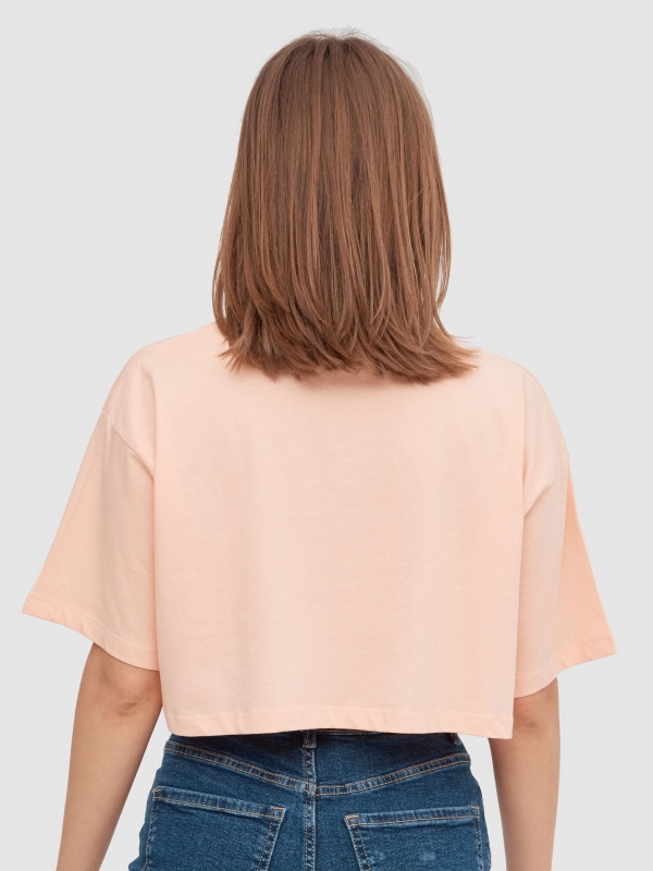 Camiseta crop cocodrilo rosa vista media trasera