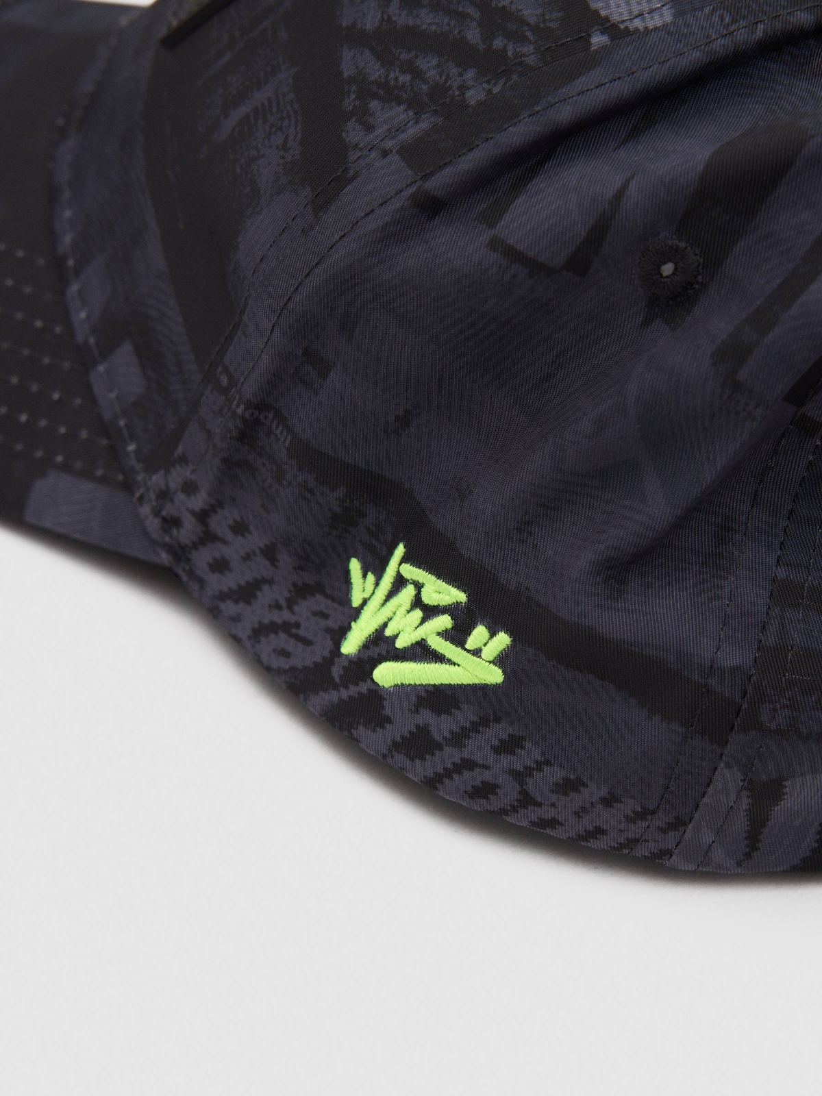 Textured text cap black detail view