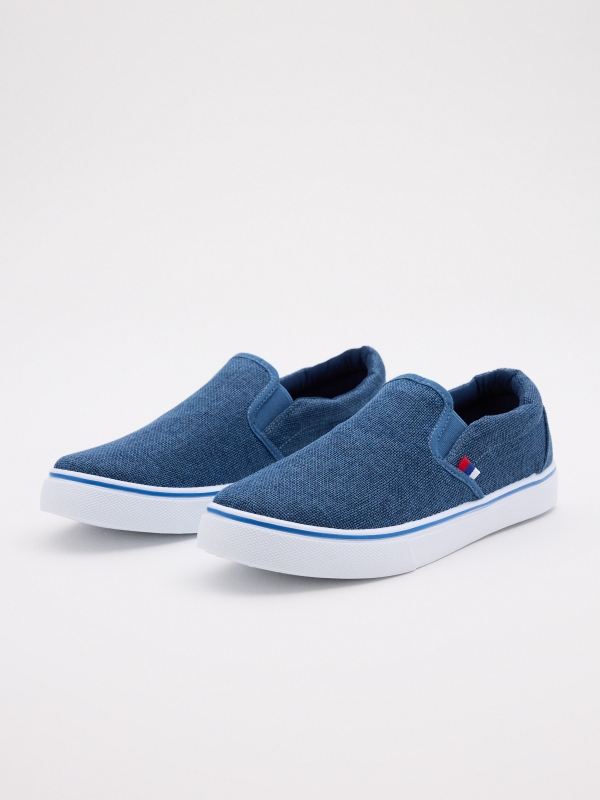 Elastic blue canvas shoes blue 45º front view