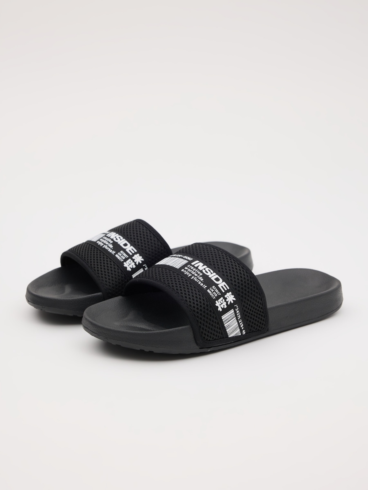 Nylon flip flops black 45º front view