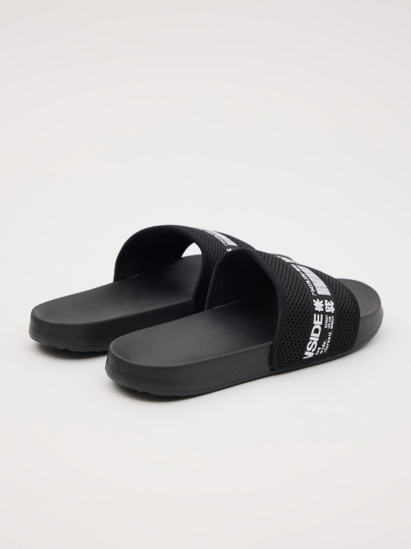 Nylon flip flops black 45º back view