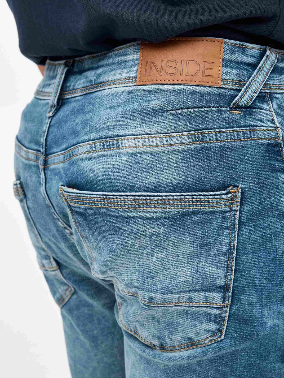 Distressed denim bermuda short blue detail view