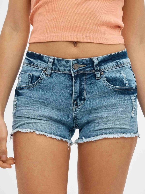 Ripped distressed denim shorts blue detail view