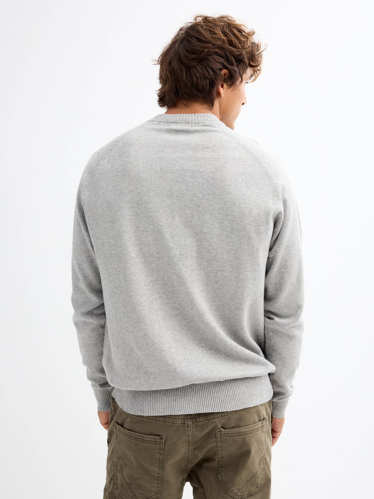 Plain sweater round neck light grey middle back view