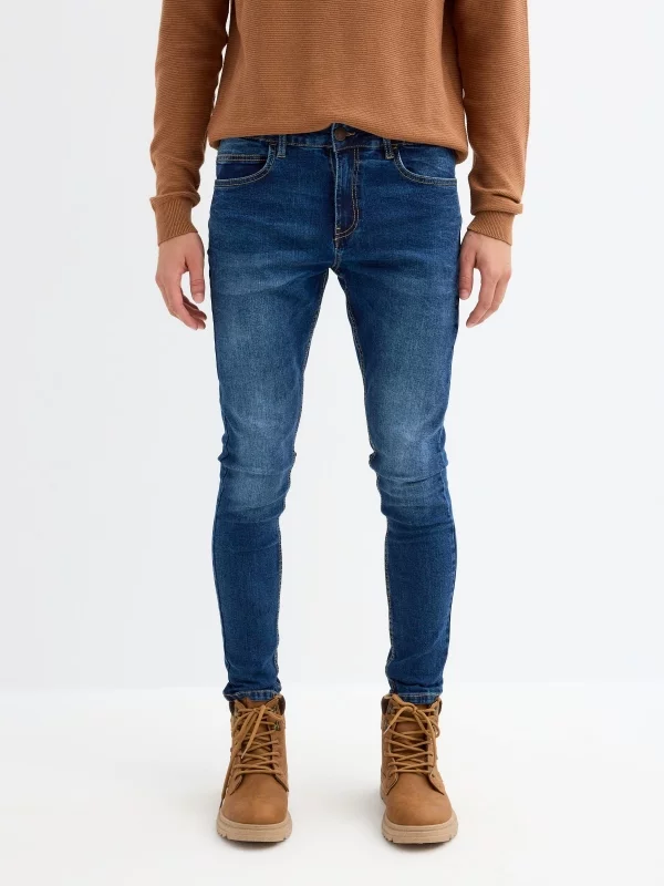 Dark skinny skinny jeans blue middle front view