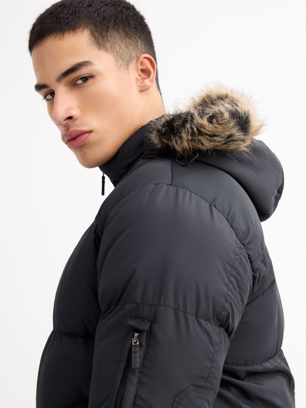 Quilted coat with fur hood black detail view