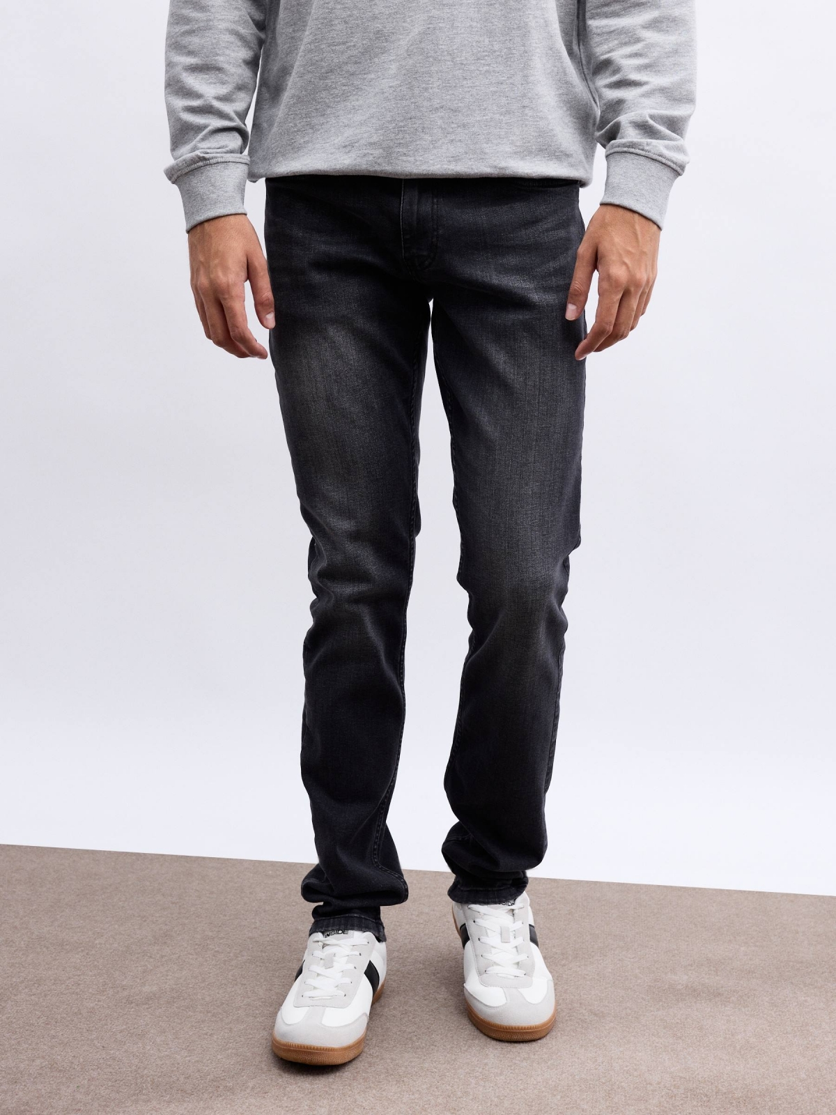 Grey denim slim jeans black middle front view