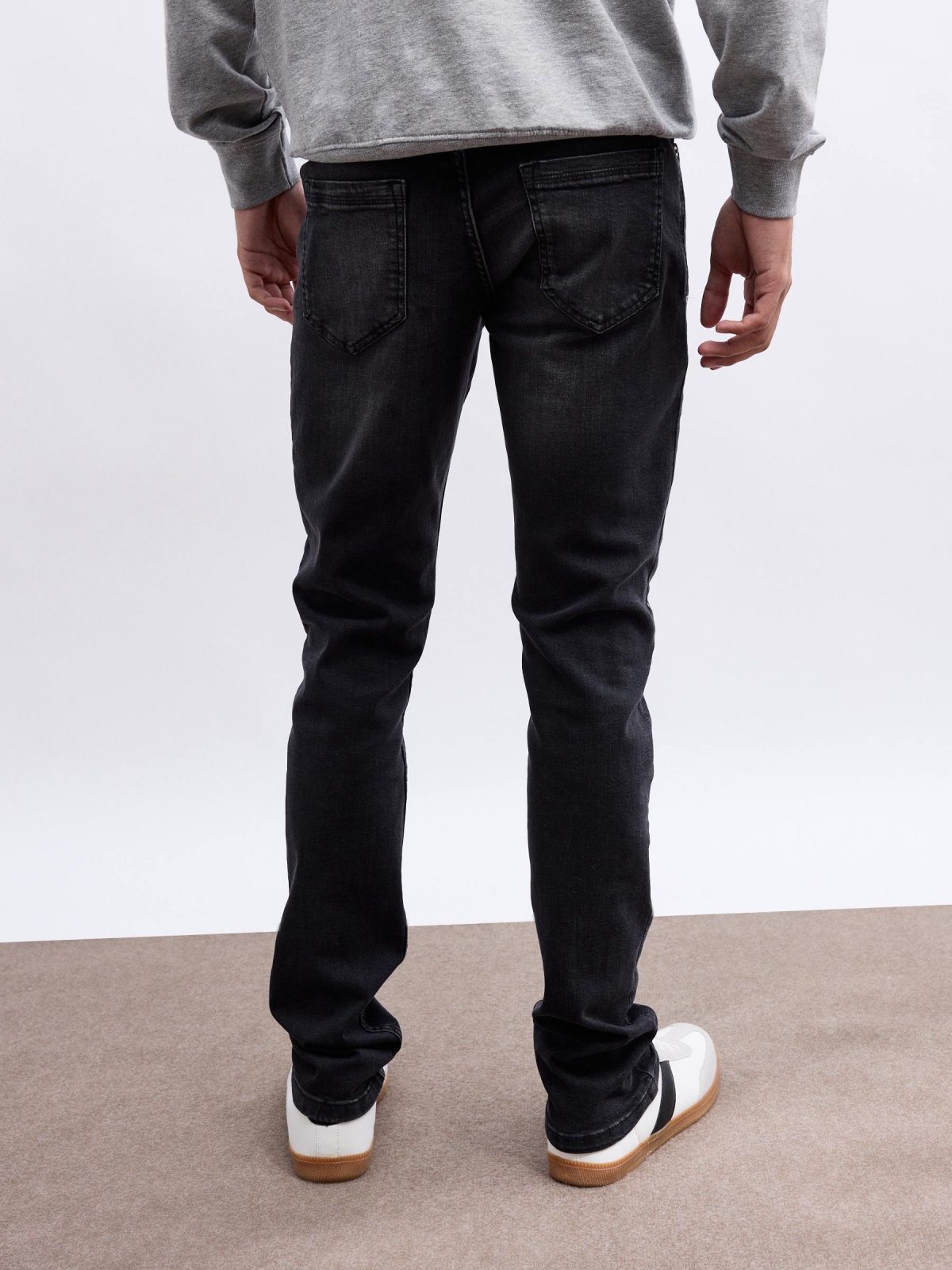 Jeans slim denim gris negro vista media trasera