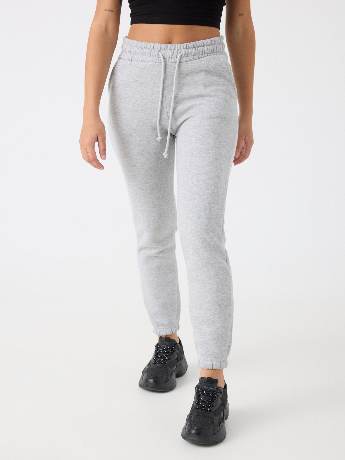 Pantalón jogger felpa gris melange vista media frontal