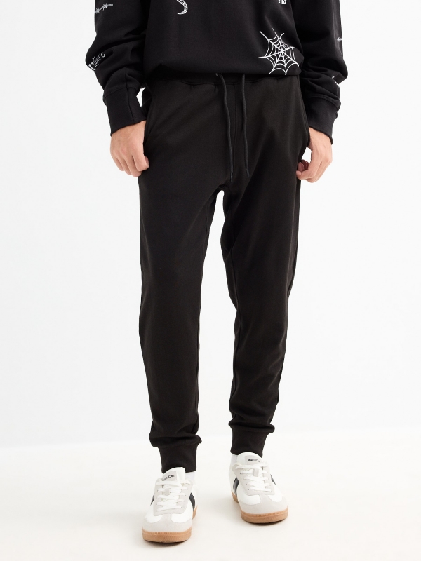 Sport jogger pants black middle front view