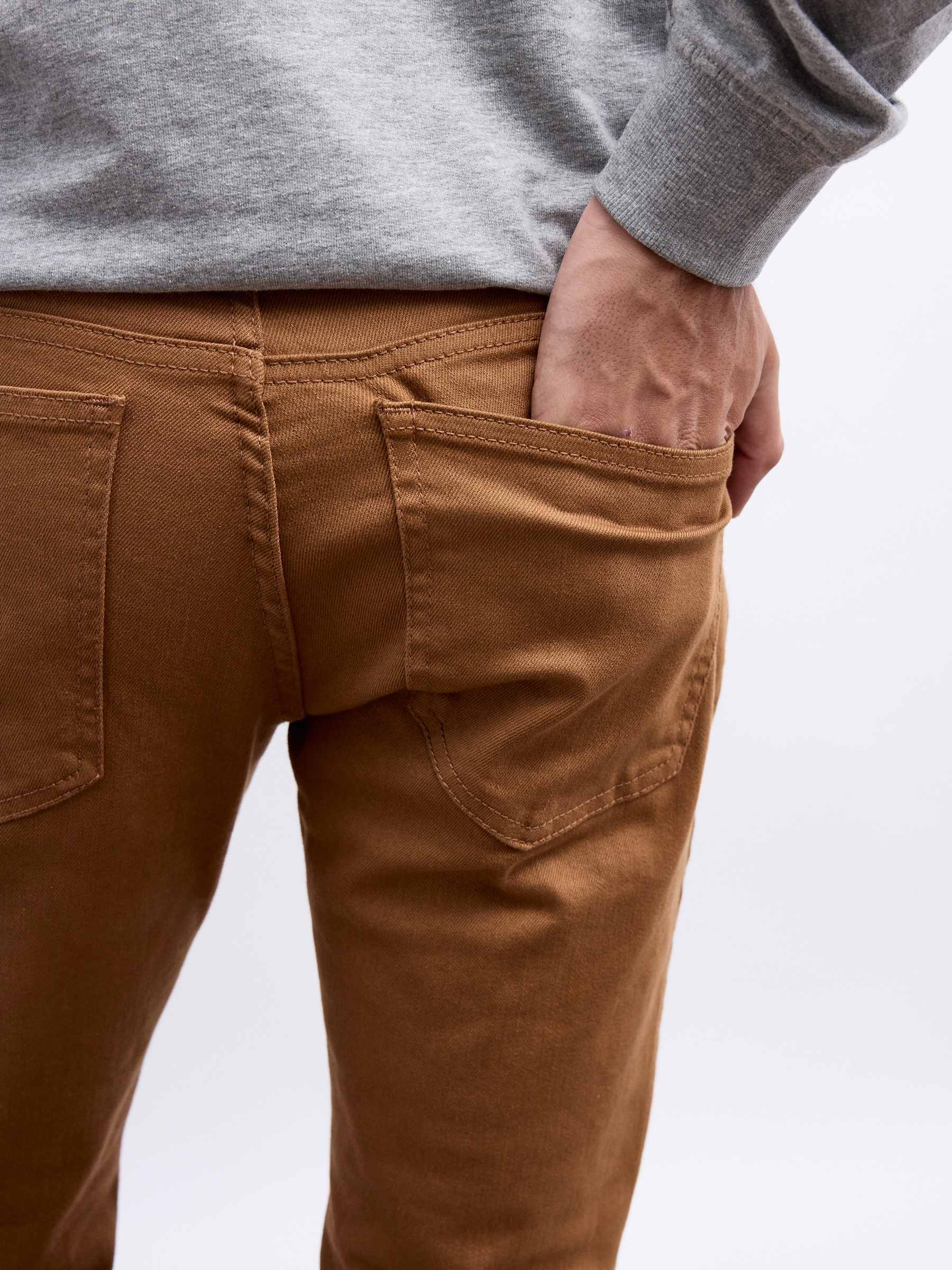 Basic colored jeans brown front view