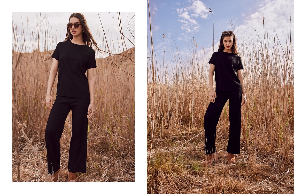 Textured fluid trousers black front view