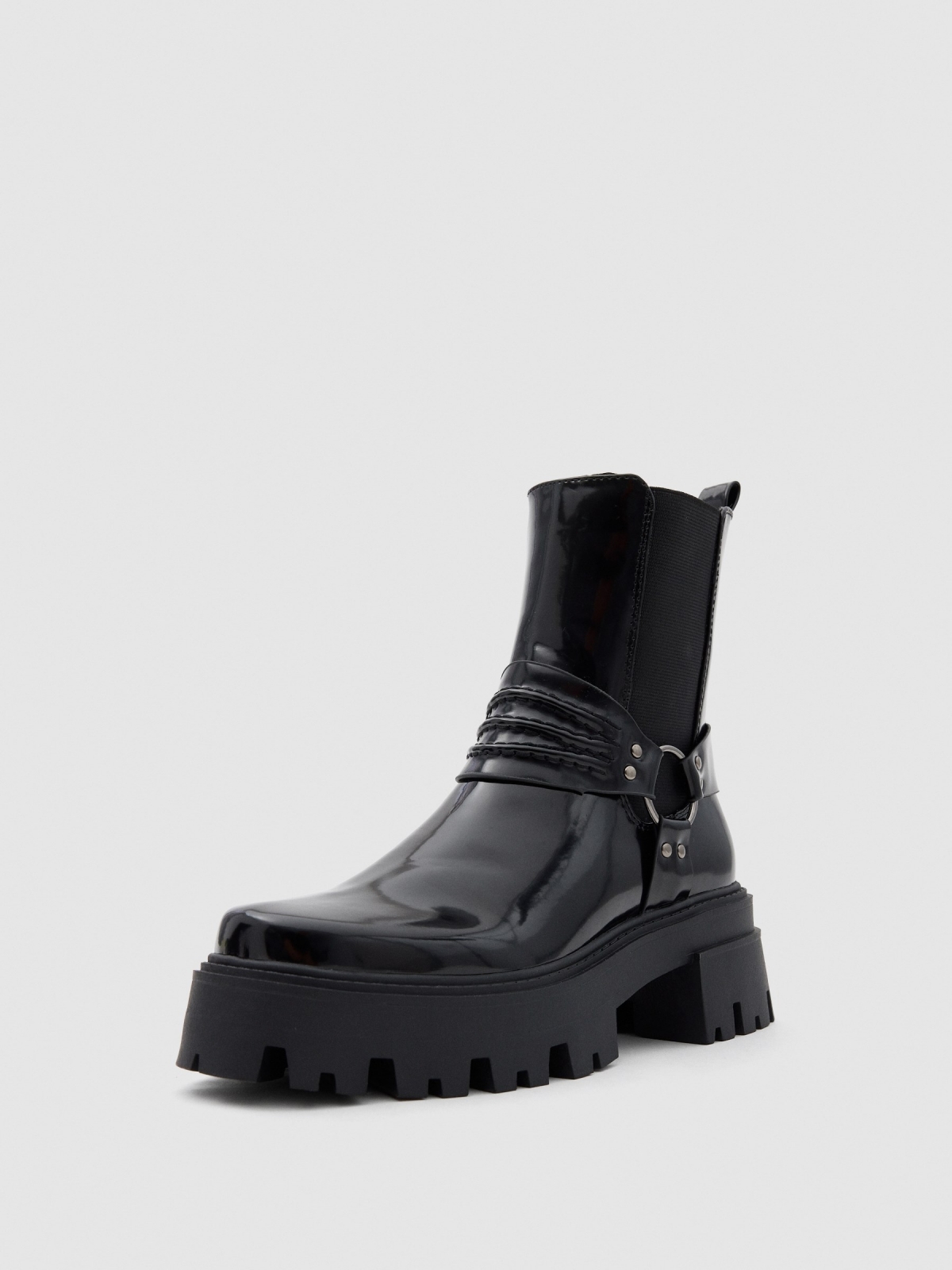 Patent leather ankle boots with straps black detail view