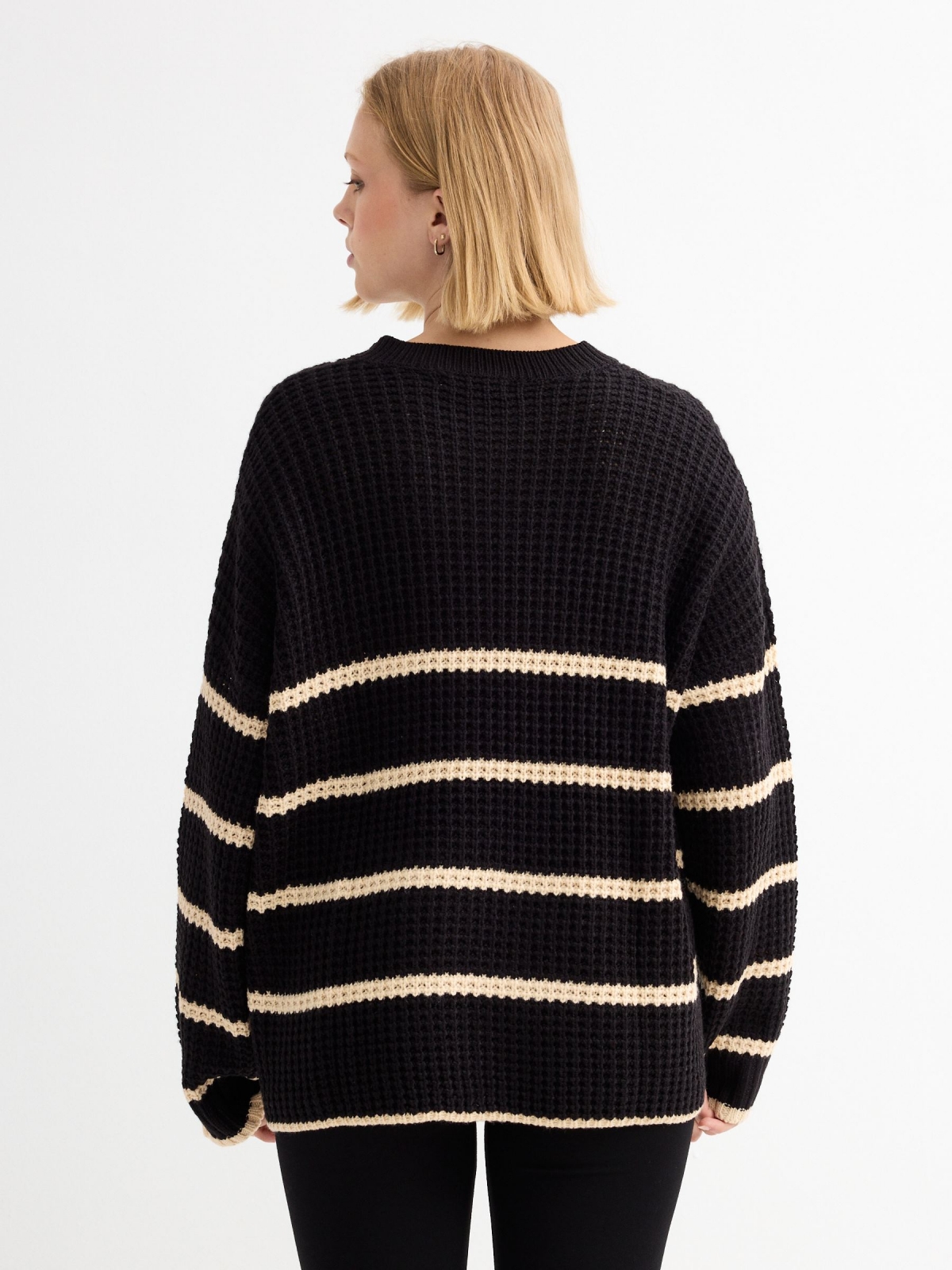 Oversize knitted sweater black stripes black middle back view