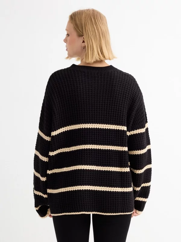 Oversize knitted sweater black stripes black middle back view