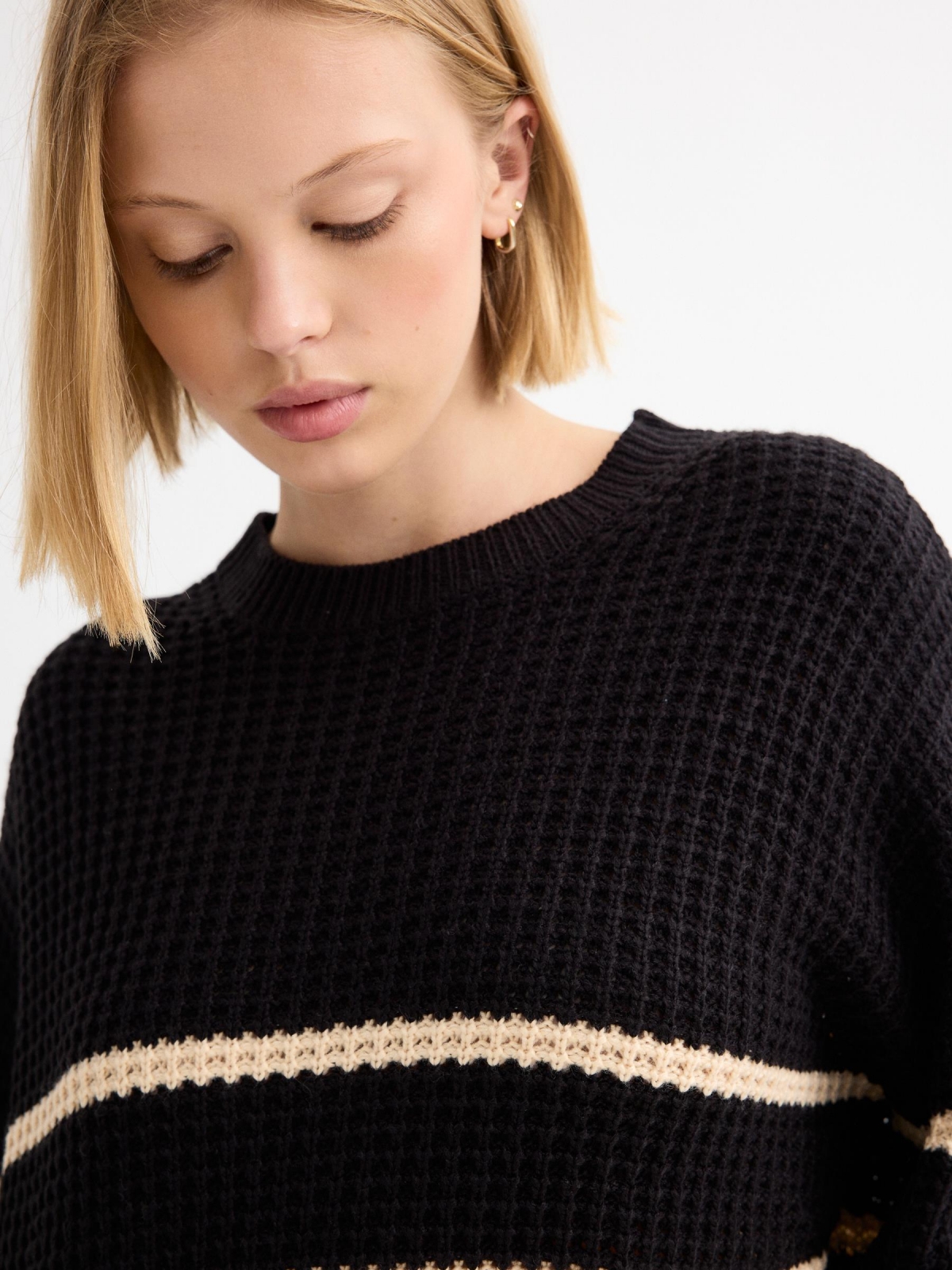 Oversize knitted sweater black stripes black detail view