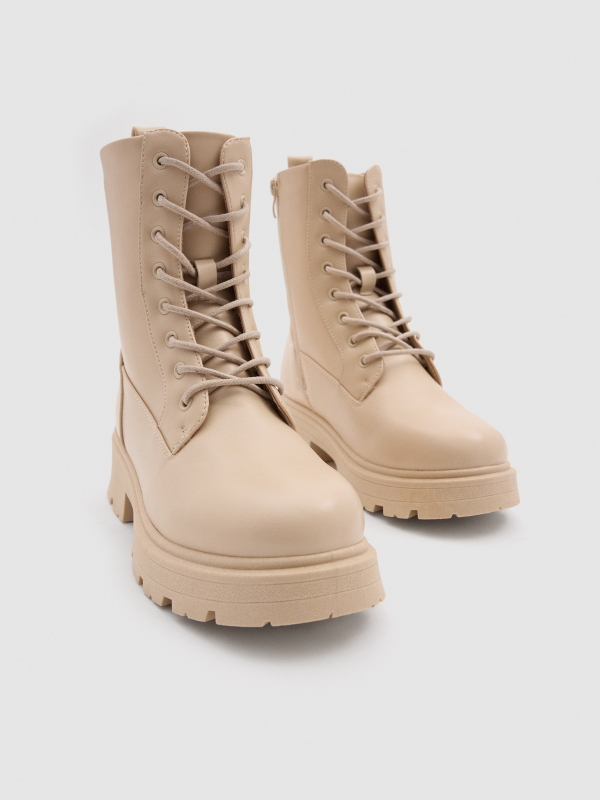 Classic beige military boot raw detail view