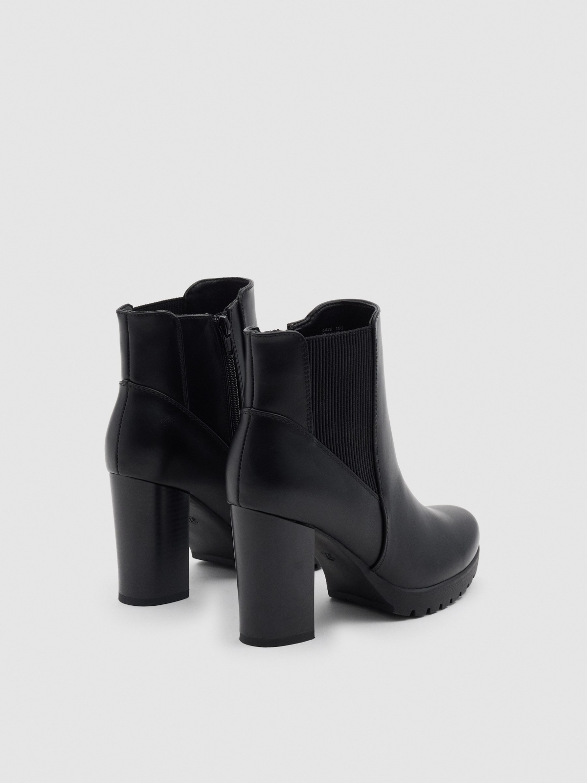 Heeled boots without closure black 45º back view