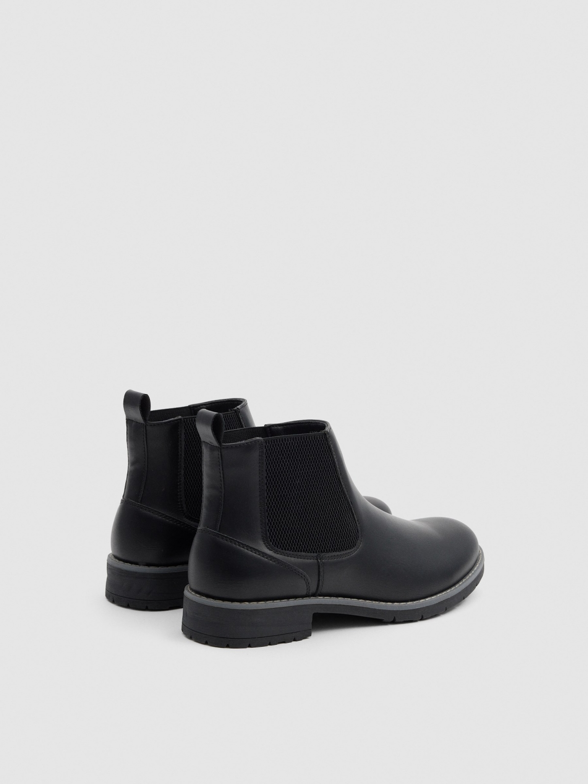 Black faux leather Chelsea boots black 45º back view