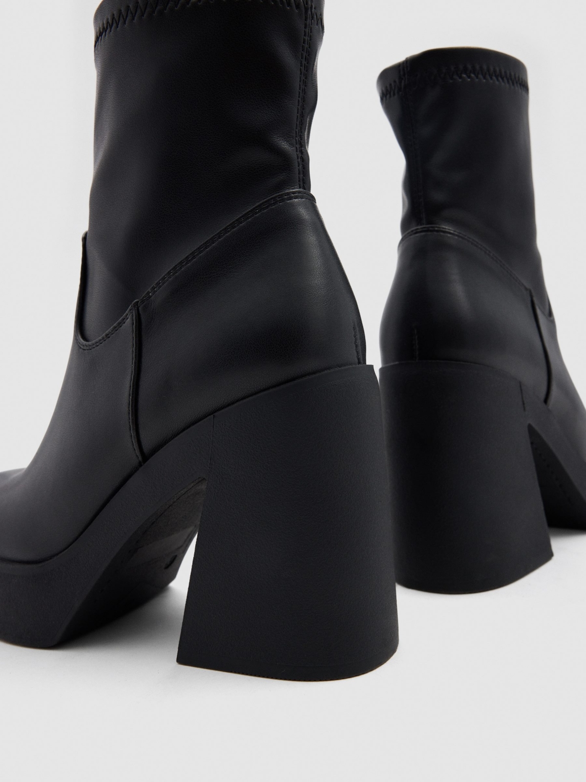 Square heel boot black detail view