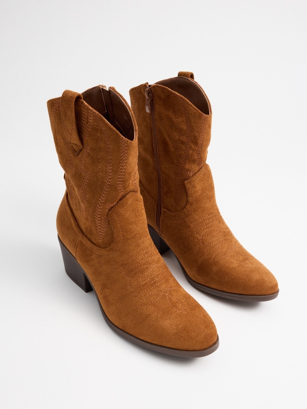 Botas de cowboy marrons marrom vista detalhe