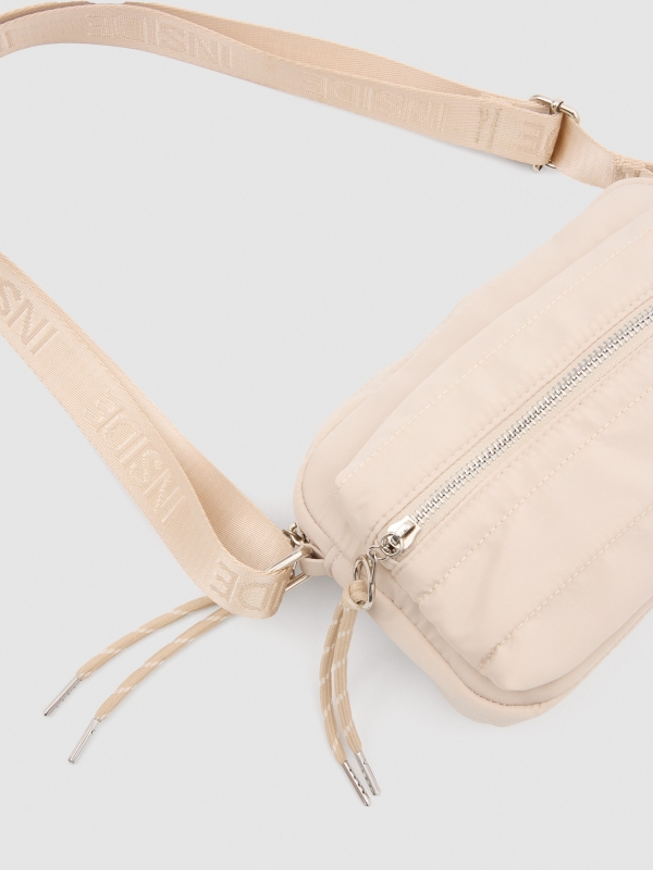 Padded shoulder bag sand detail view