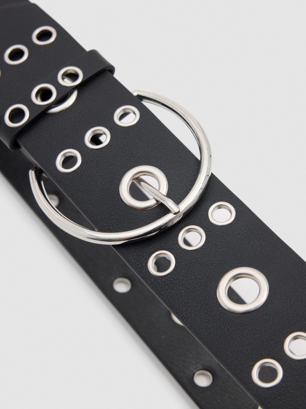 Black leatherette belt with round buckle eyelets. black detail view