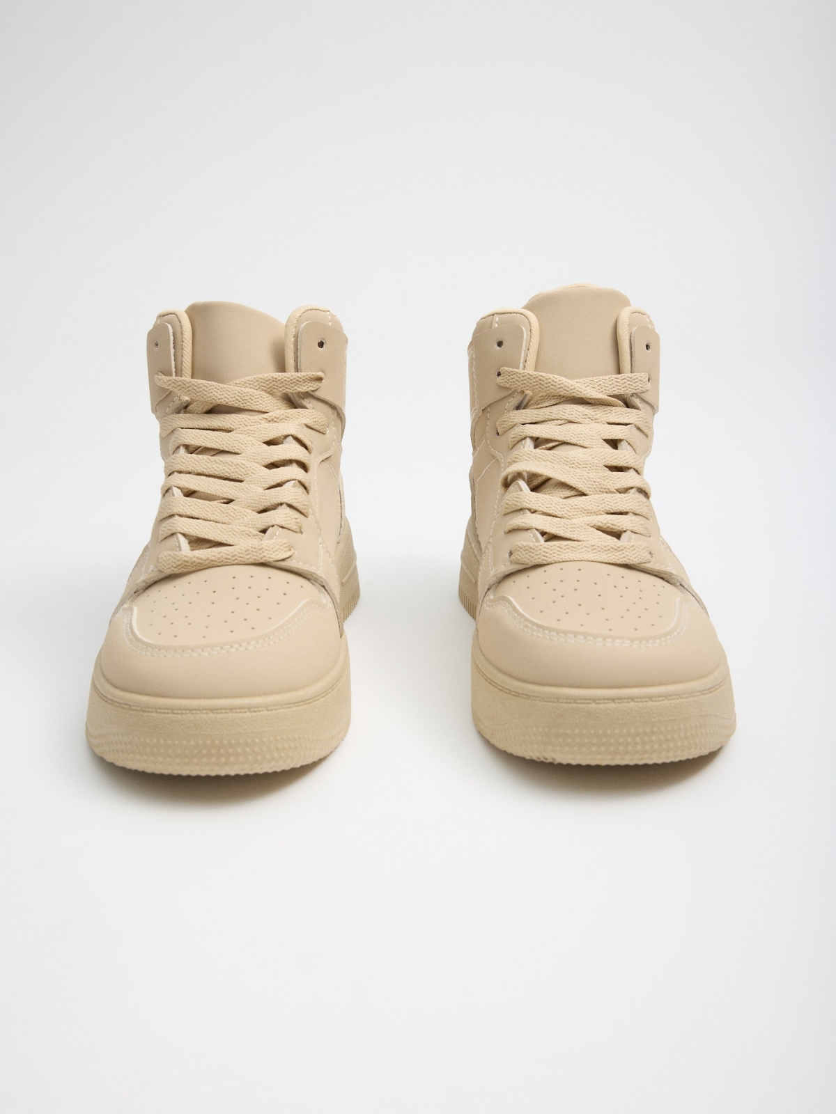 High-top basketball sneakers with platform beige detail view