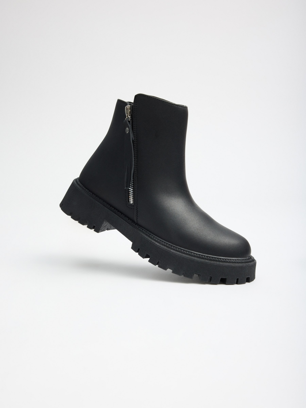 Black platform boot with zipper black detail view