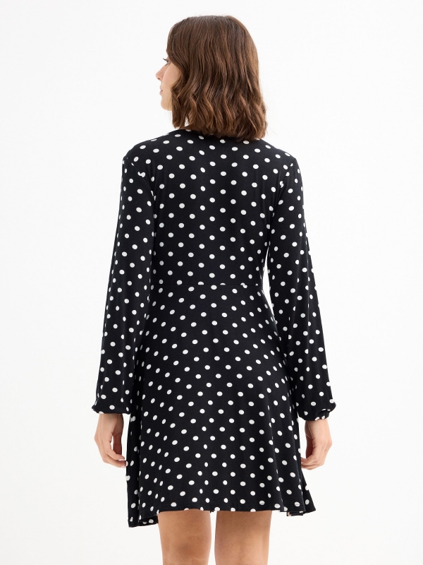 Vestido escote pico print lunares negro vista tres cuartos trasera