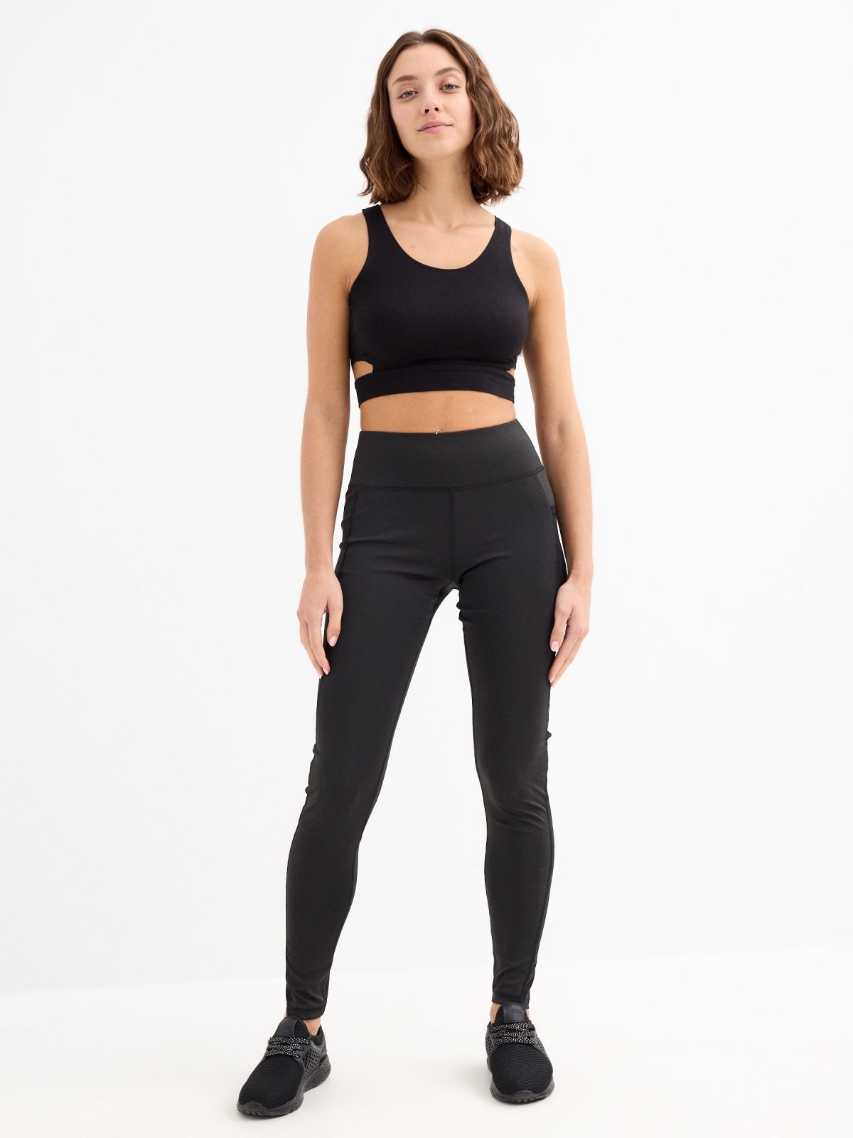 Leggings con bolsillo de mesh negro vista general frontal