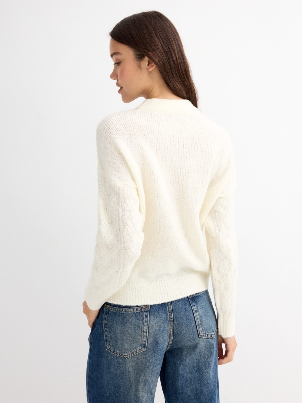 Knitted sweater round neck off white middle back view