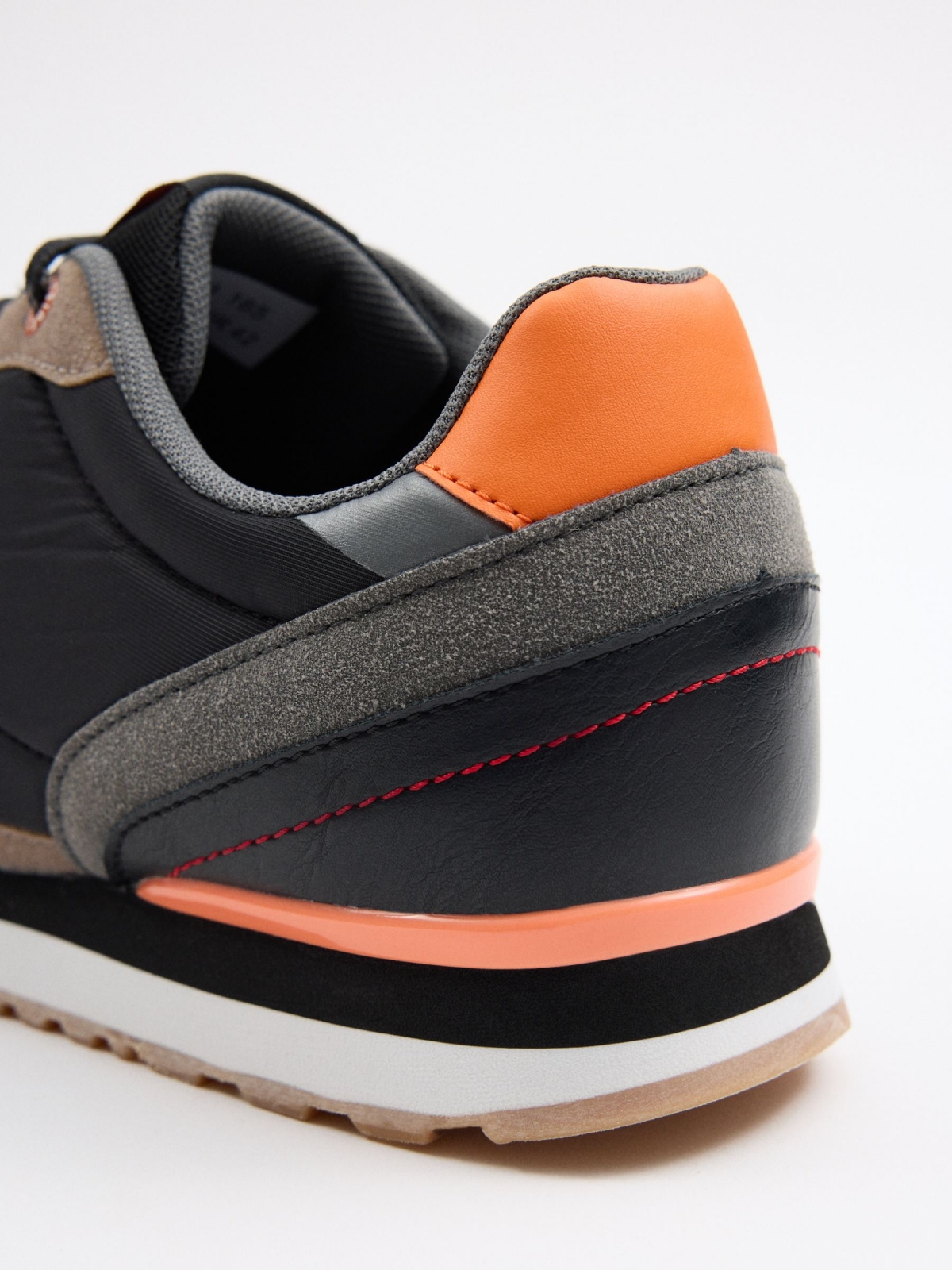 Black casual sneaker detail view