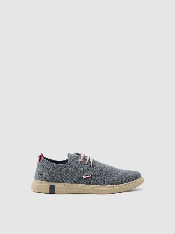 Worn canvas sneaker dark blue