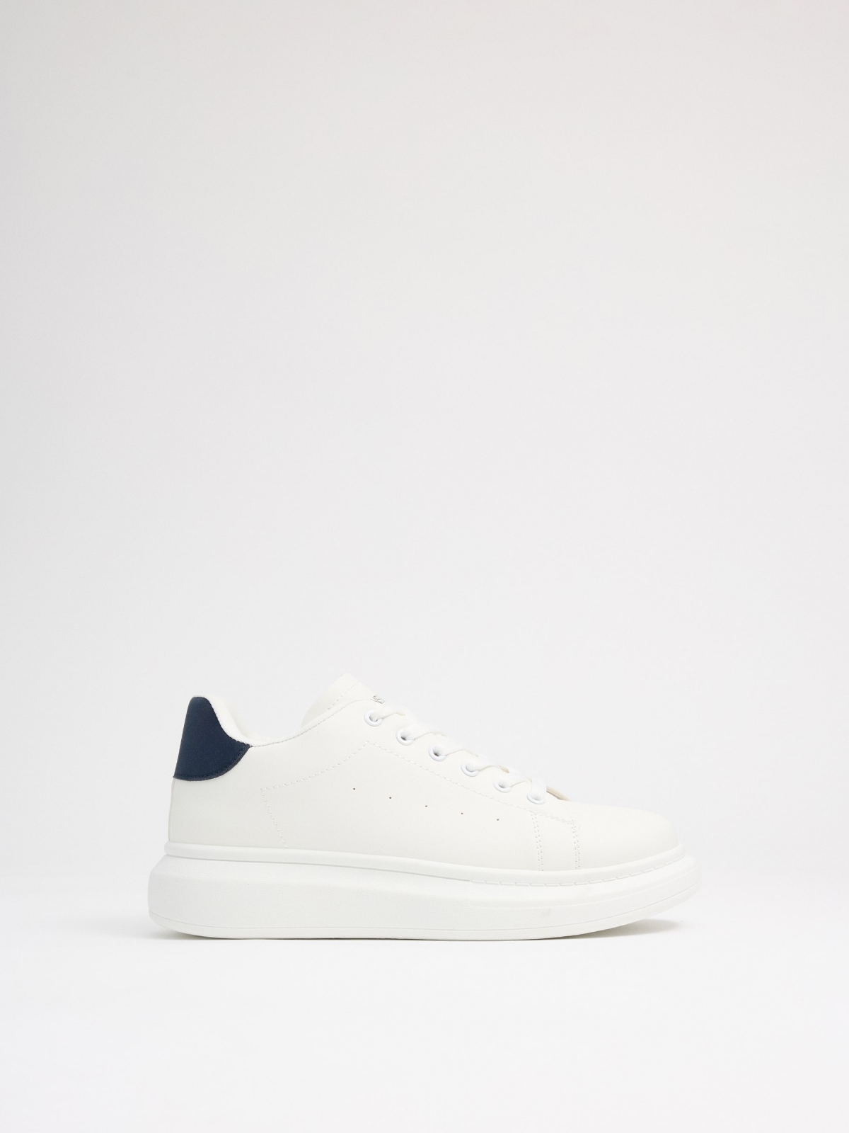 White low-top sneakers white profile view