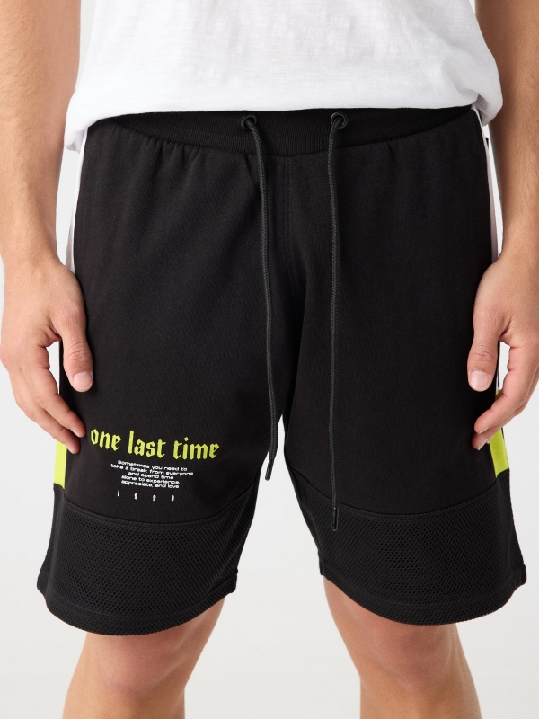 Combined bermuda jogger short with text black detail view