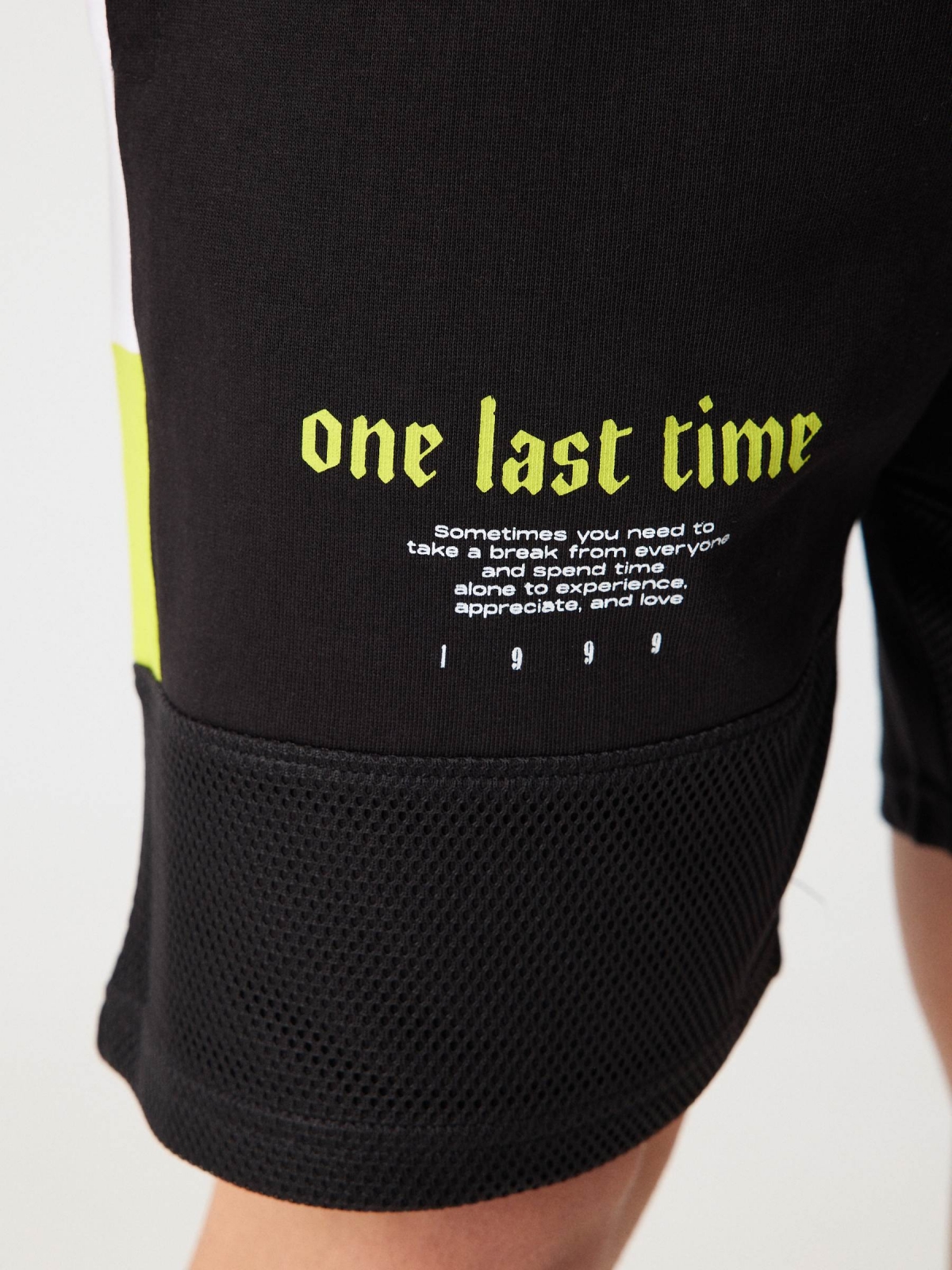 Combined bermuda jogger short with text black detail view