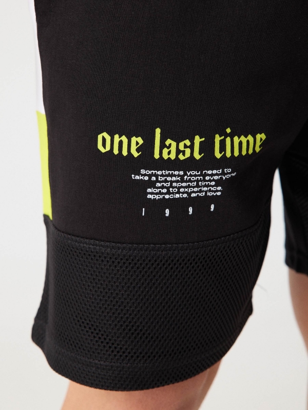Combined bermuda jogger short with text black detail view
