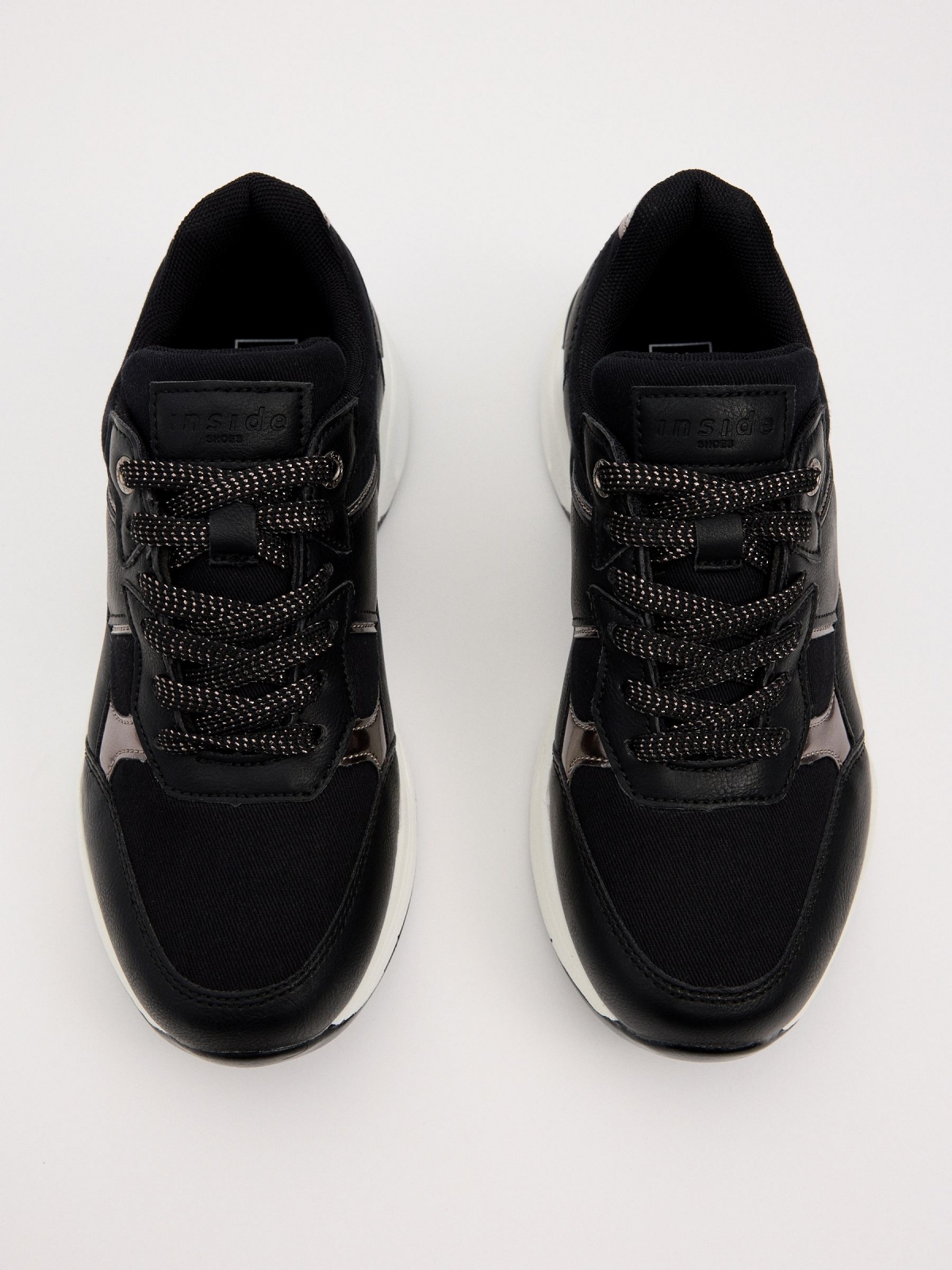 Air chamber volume sole sneaker black zenithal view