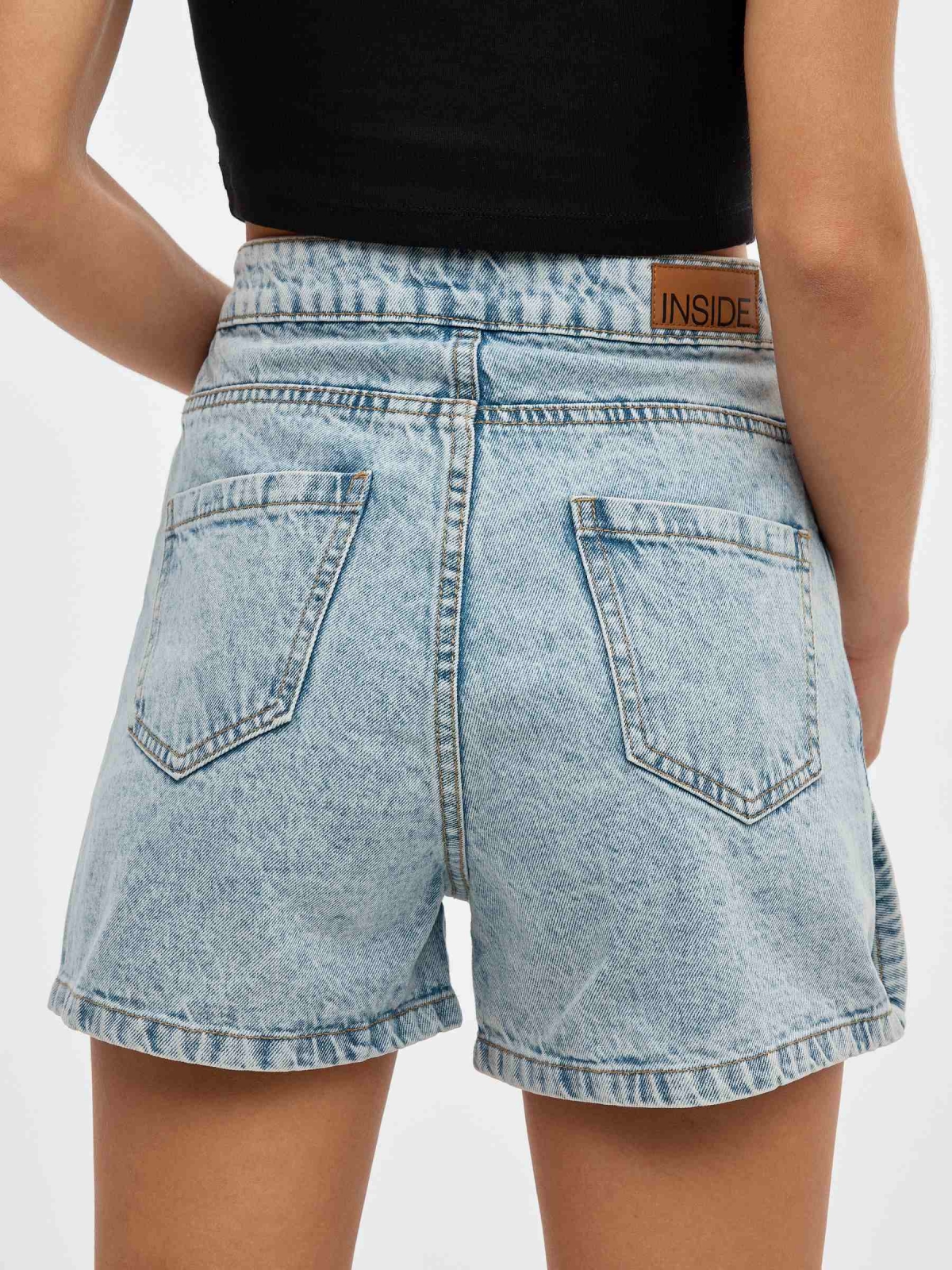 Denim skort with buttons light blue detail view