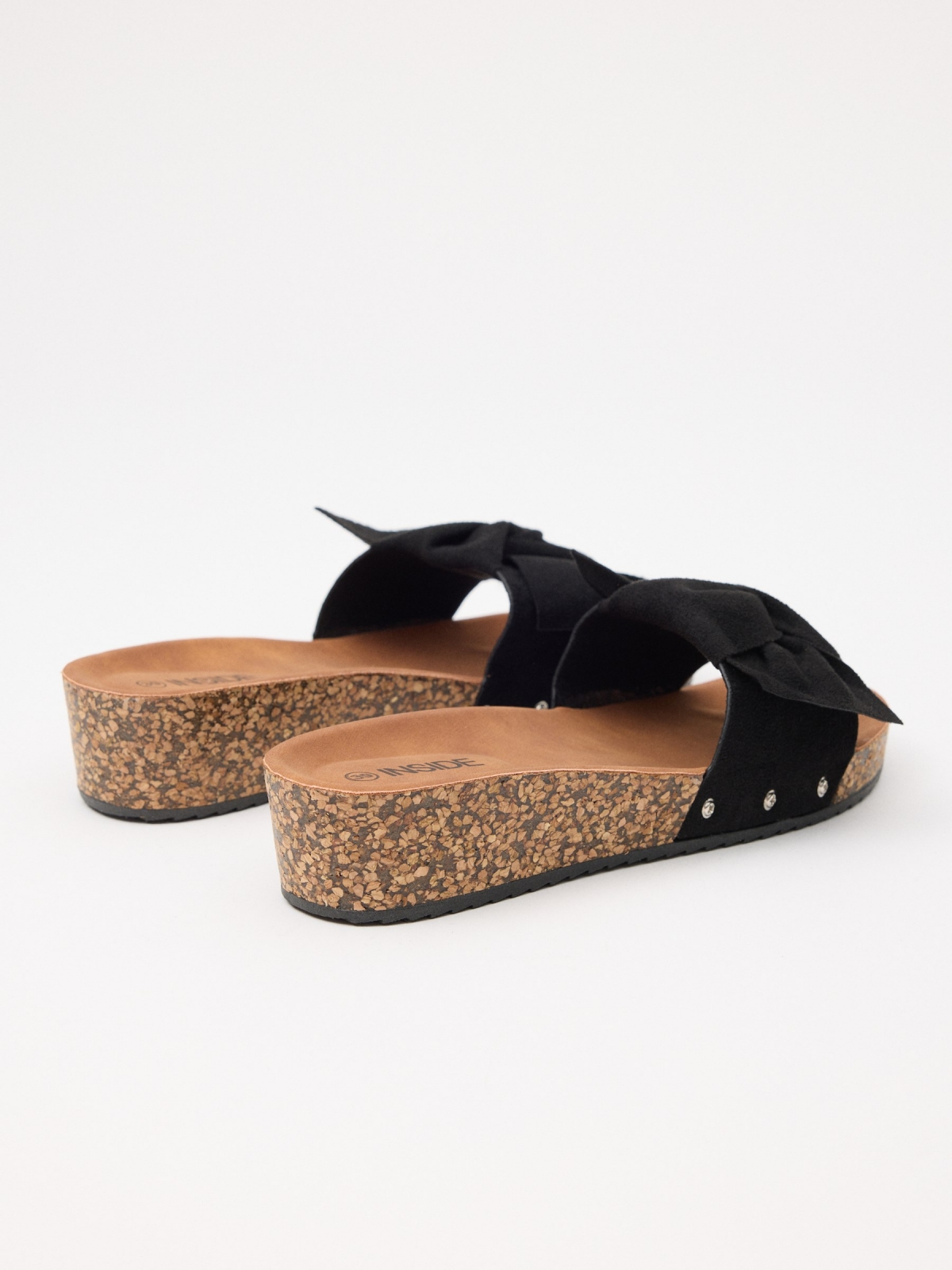 Bow wedge sandal black 45º back view