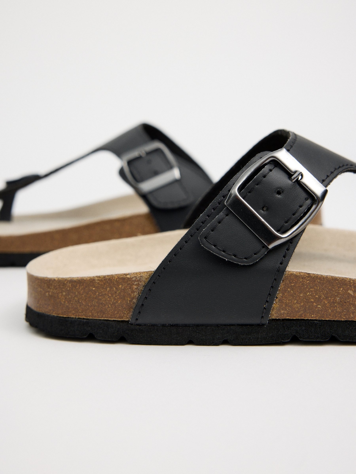 Black sandal with buckle black detail view