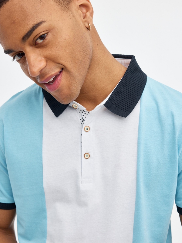 Blue color block polo shirt light blue detail view