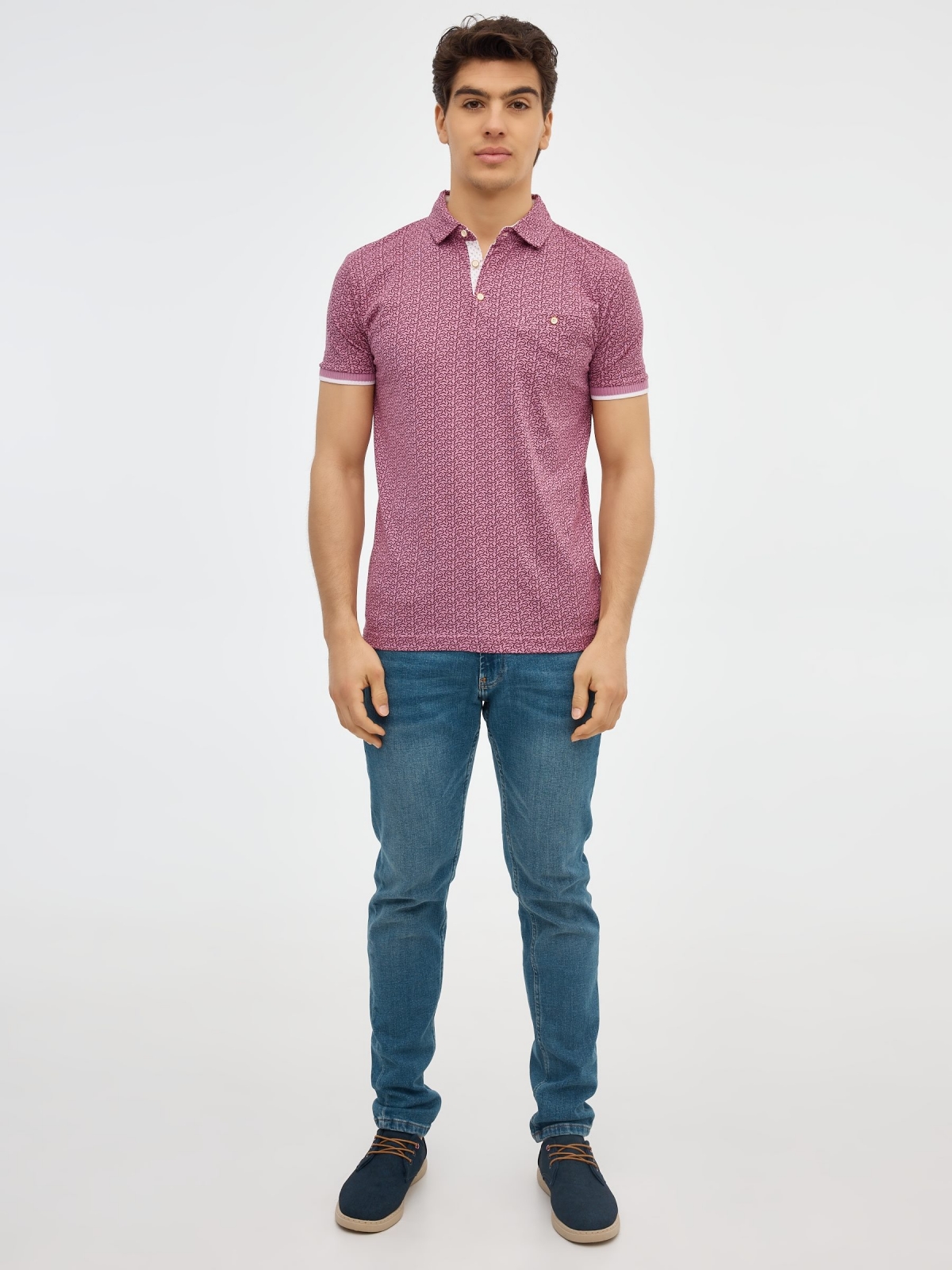 Red geometric print polo shirt purple front view