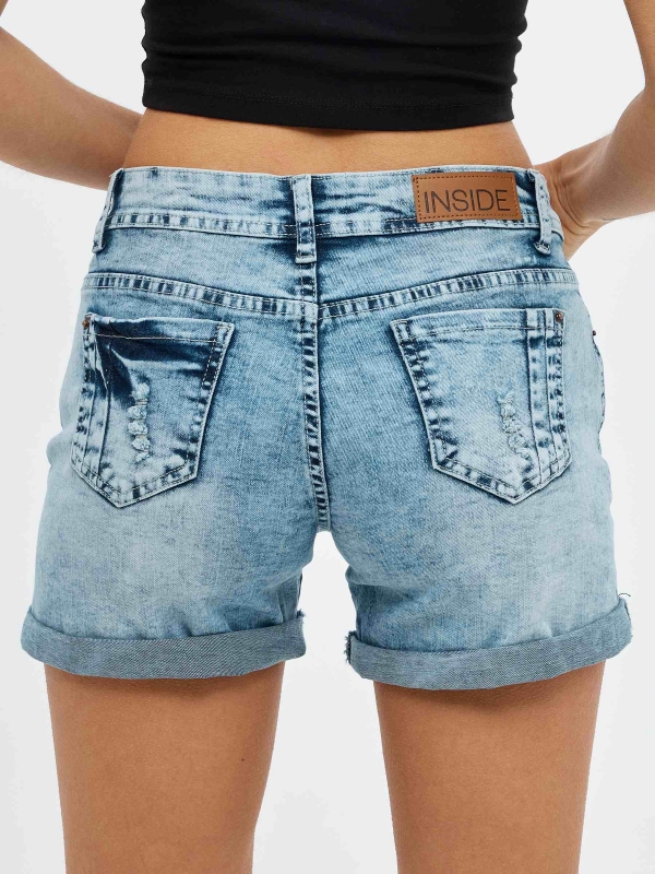 Distressed blue denim shorts blue detail view