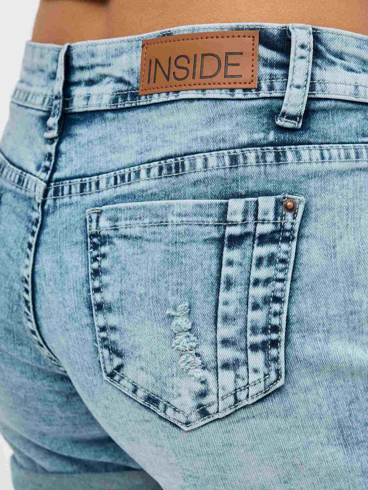 Distressed blue denim shorts blue detail view