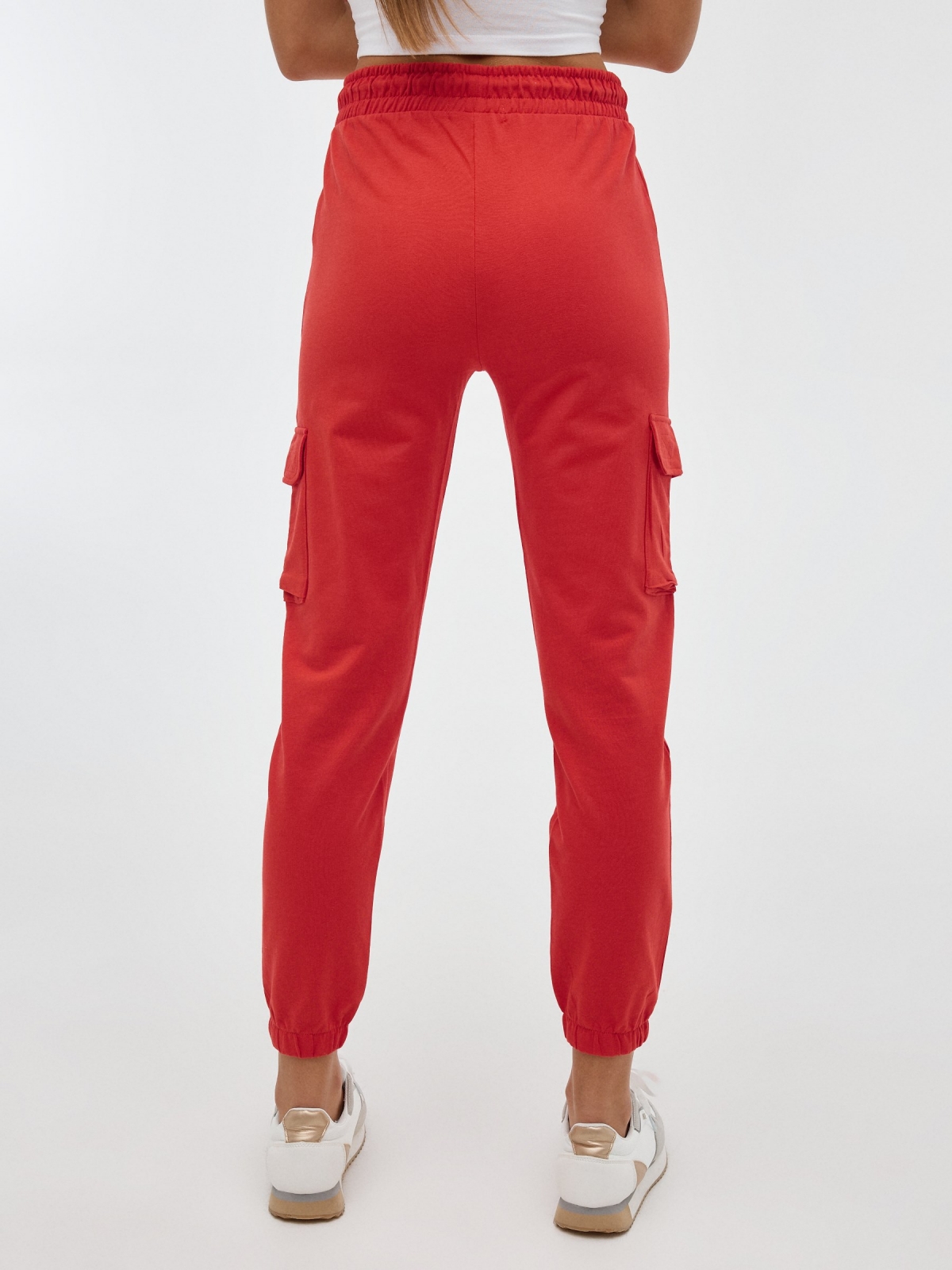 Pantalón jogger felpa naranja vista media trasera