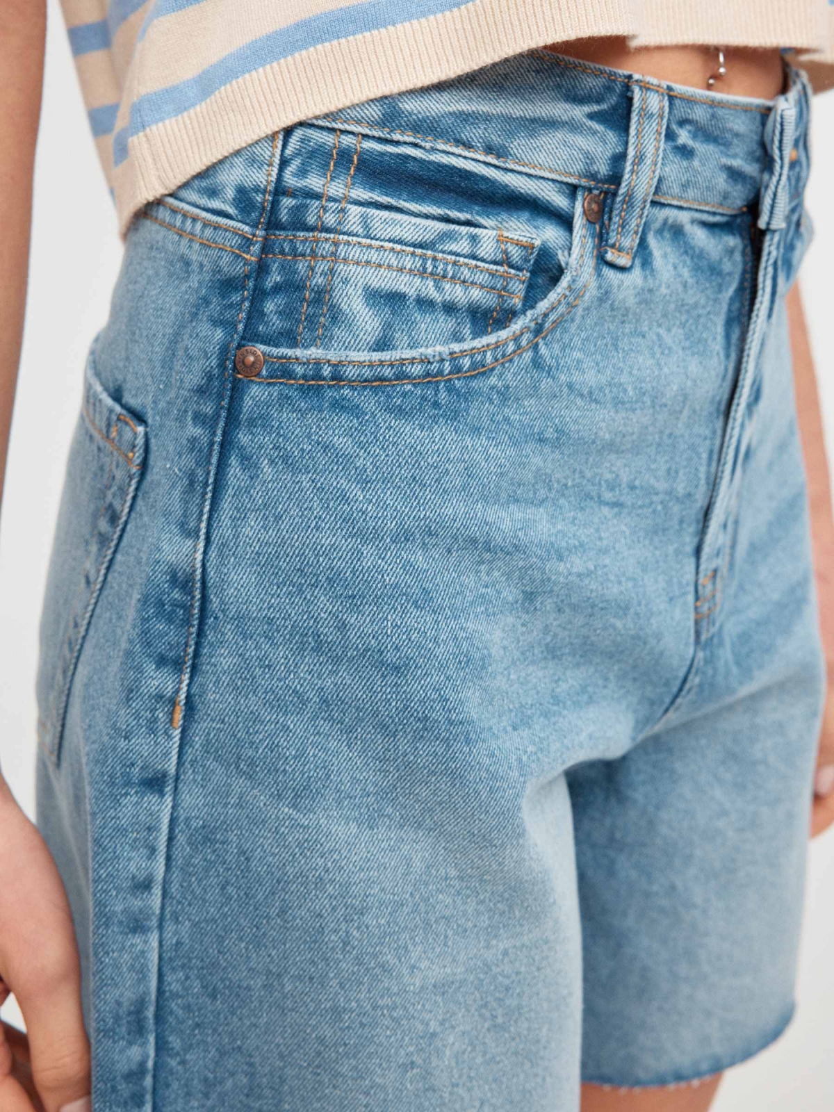 High-waisted denim shorts blue back detail view